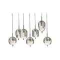 **Installation de luminaires suspendus en verre réfléchissant**